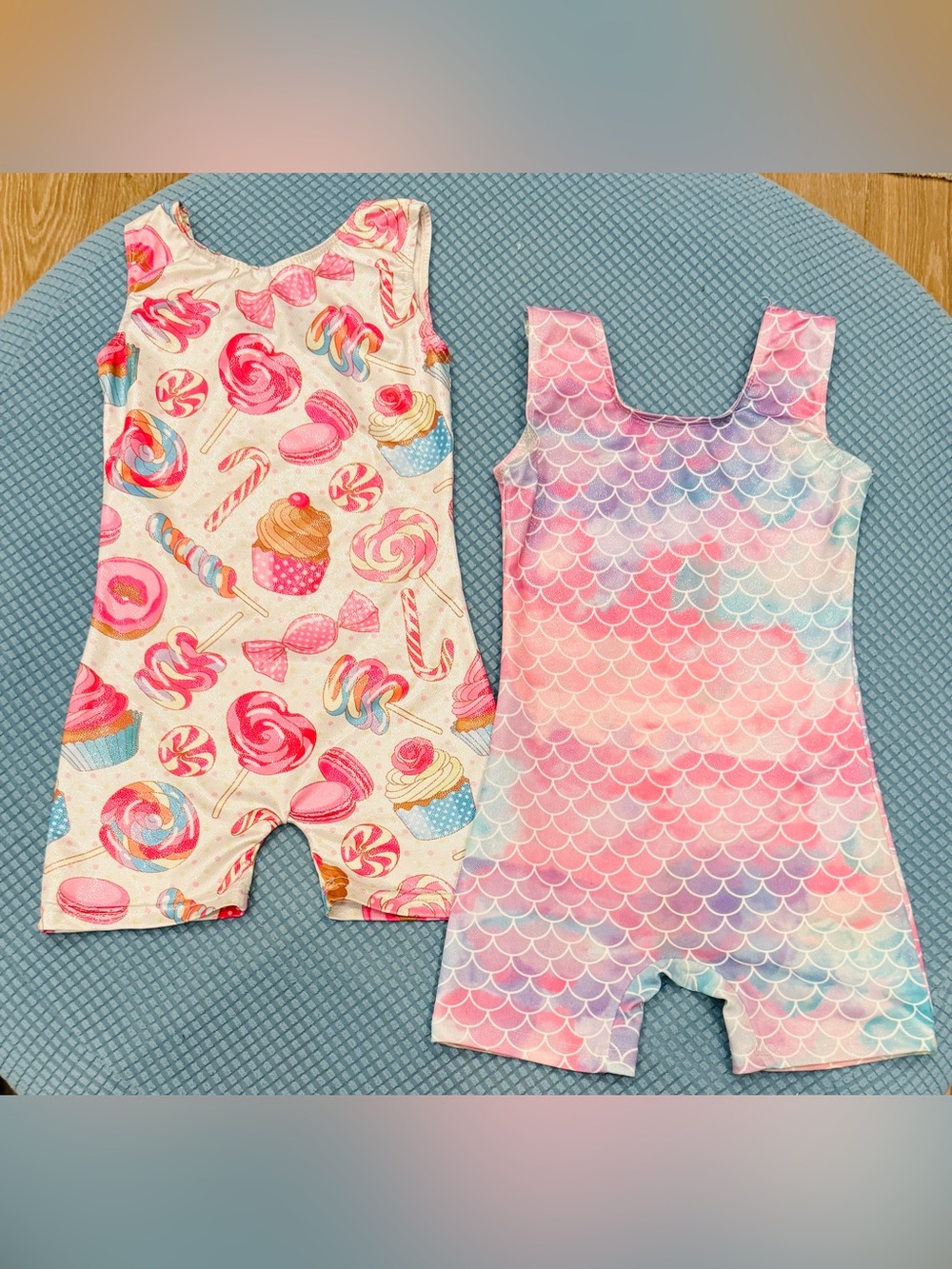 Gymnastics leotards size 120 (US 6 / 7) cute sparkly prints.